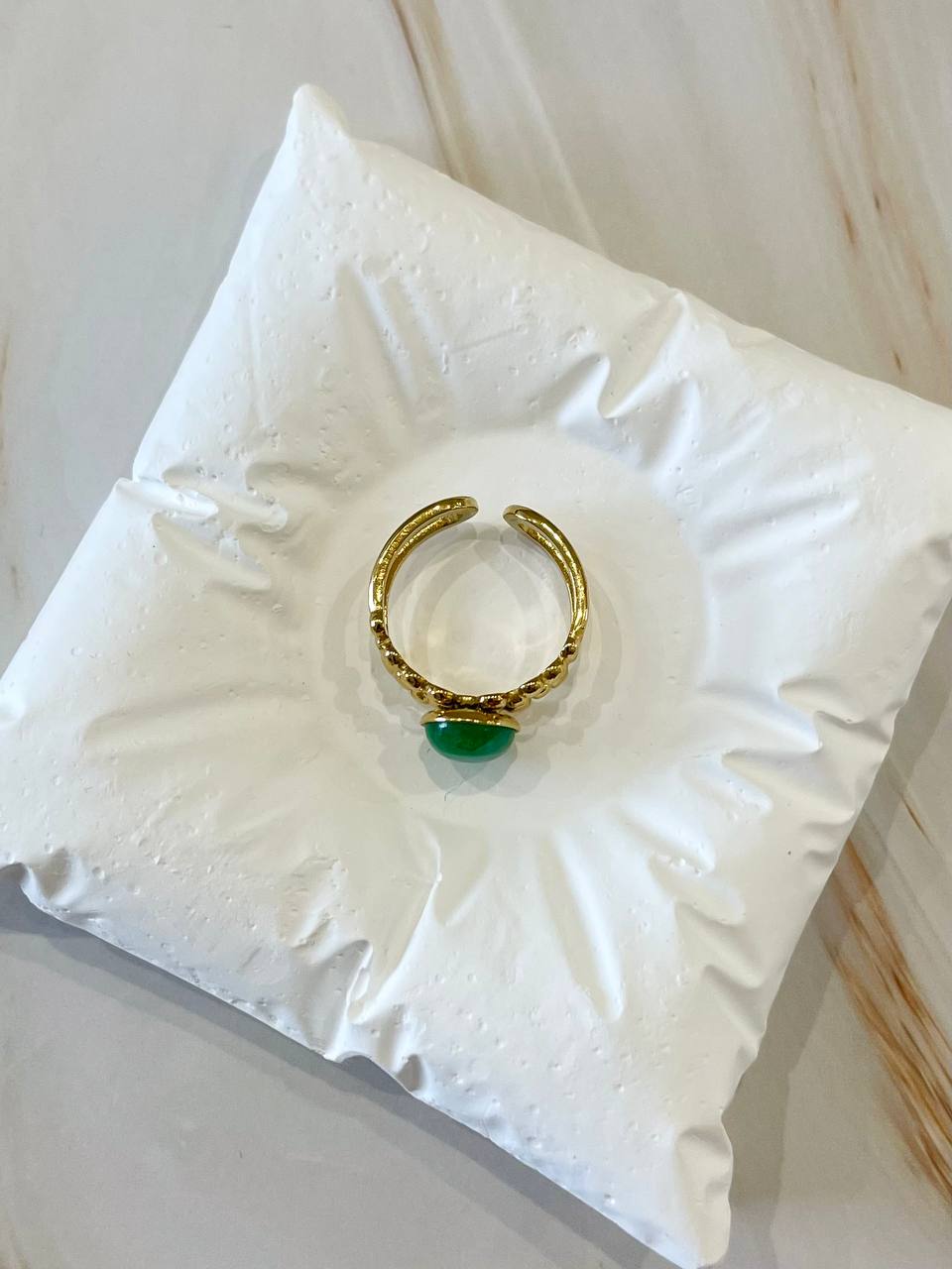 Anello bottone